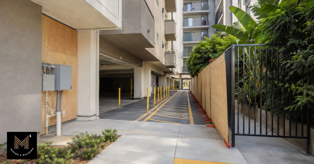 Temporary pedestrian pathway and protected access routes organized during seismic retrofit planning for an occupied apartment building.
