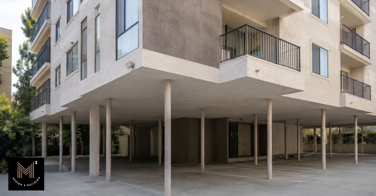 Wood-frame soft-story apartment building with tuck-under parking illustrating a common seismic retrofit building type in Los Angeles.